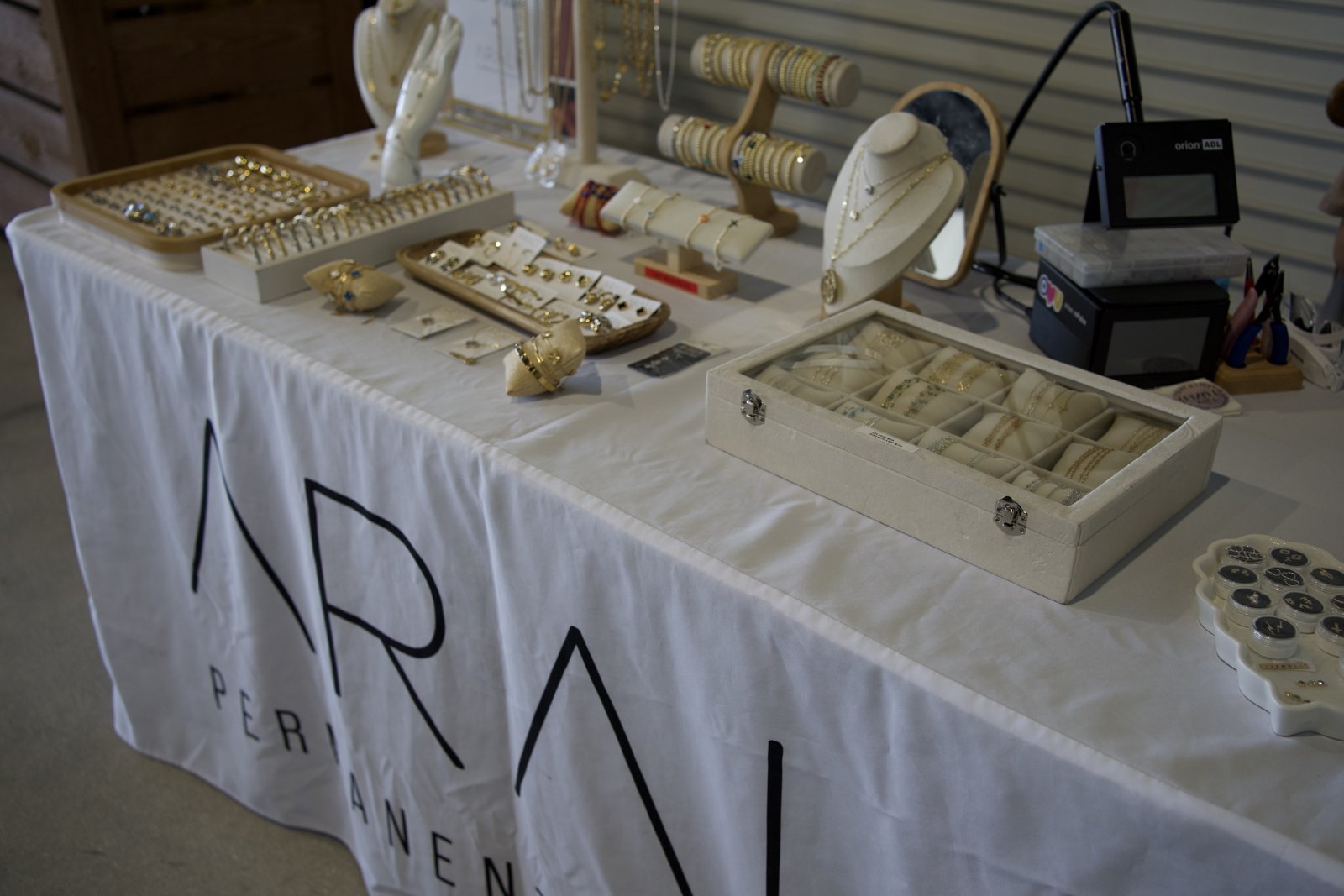 Jewelry displayed at a brand pop-up
