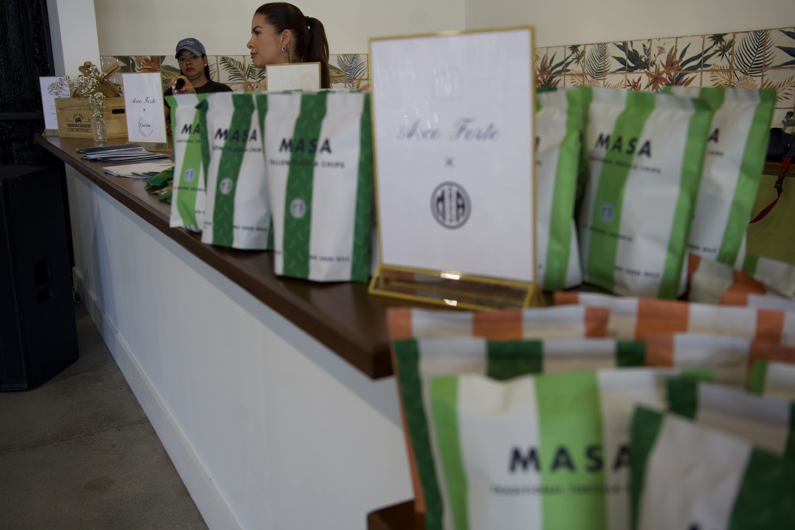 Branded snacks and partner displays at a wellness event